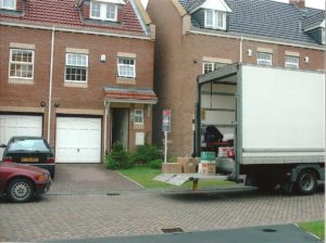 removal van outside a house