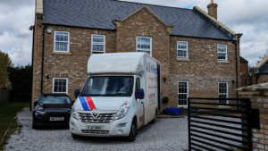AM Removals van at a private house move
