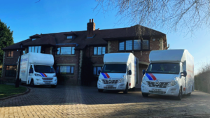 A&M Removal vans outside a house