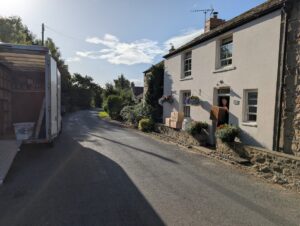 am removals van parked outside a house