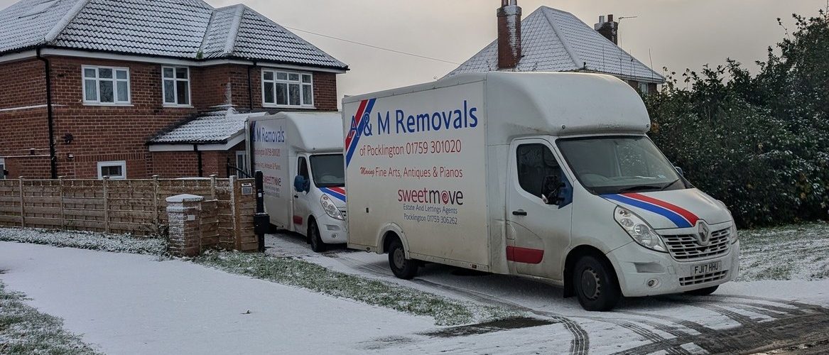 AM Removals van outside a house in Haxby, York