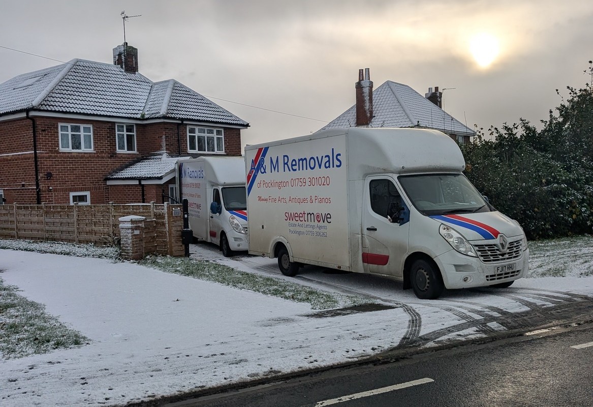 AM Removals van outside a house in Haxby, York