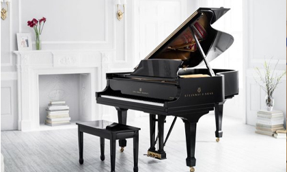 A grand piano in someone's house by A&M Removals