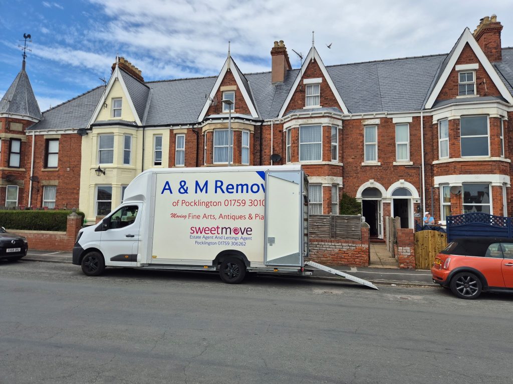 Removals van outside a house in Hornsea | A&M Removals