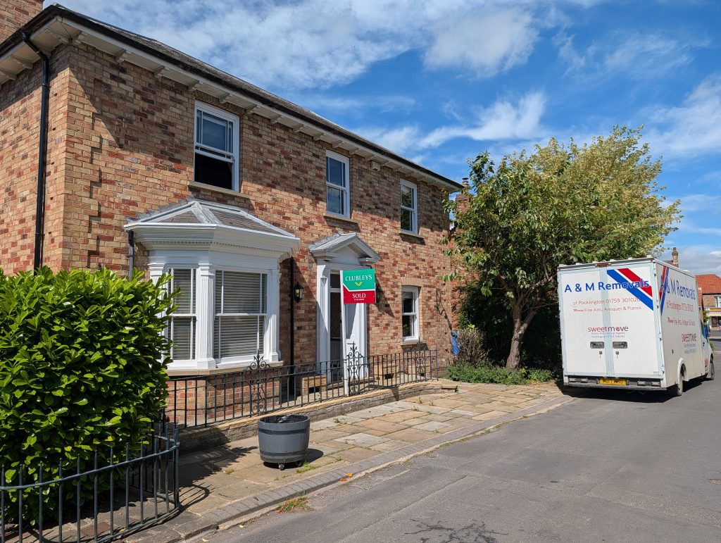 AN A&M Removals van outside a house | A&M Removals York