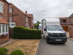 An A&M Removals van outside a house in Howden East Yorks